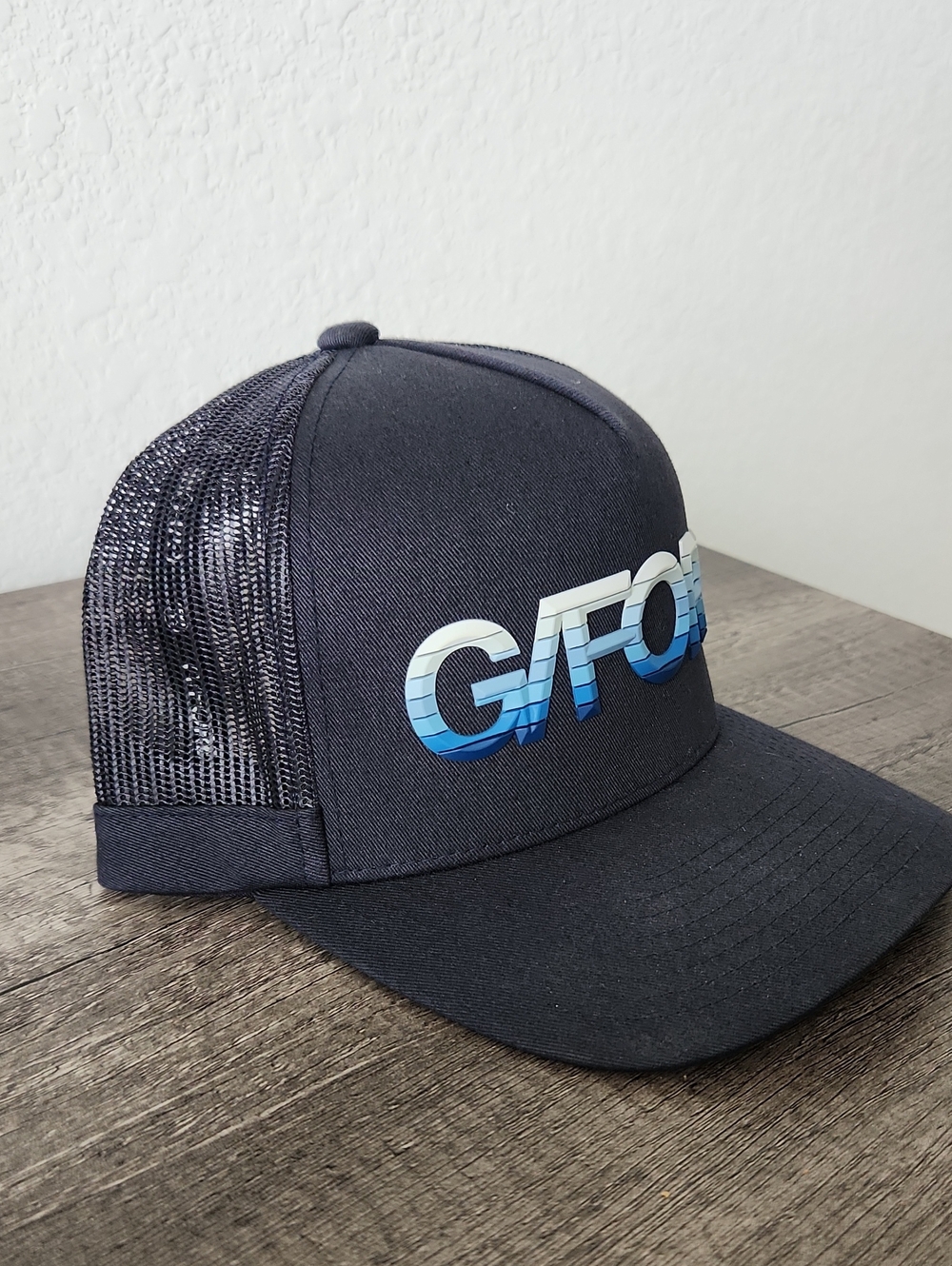 G/FORE Navy Trucker Hat with Blue Gradient Logo